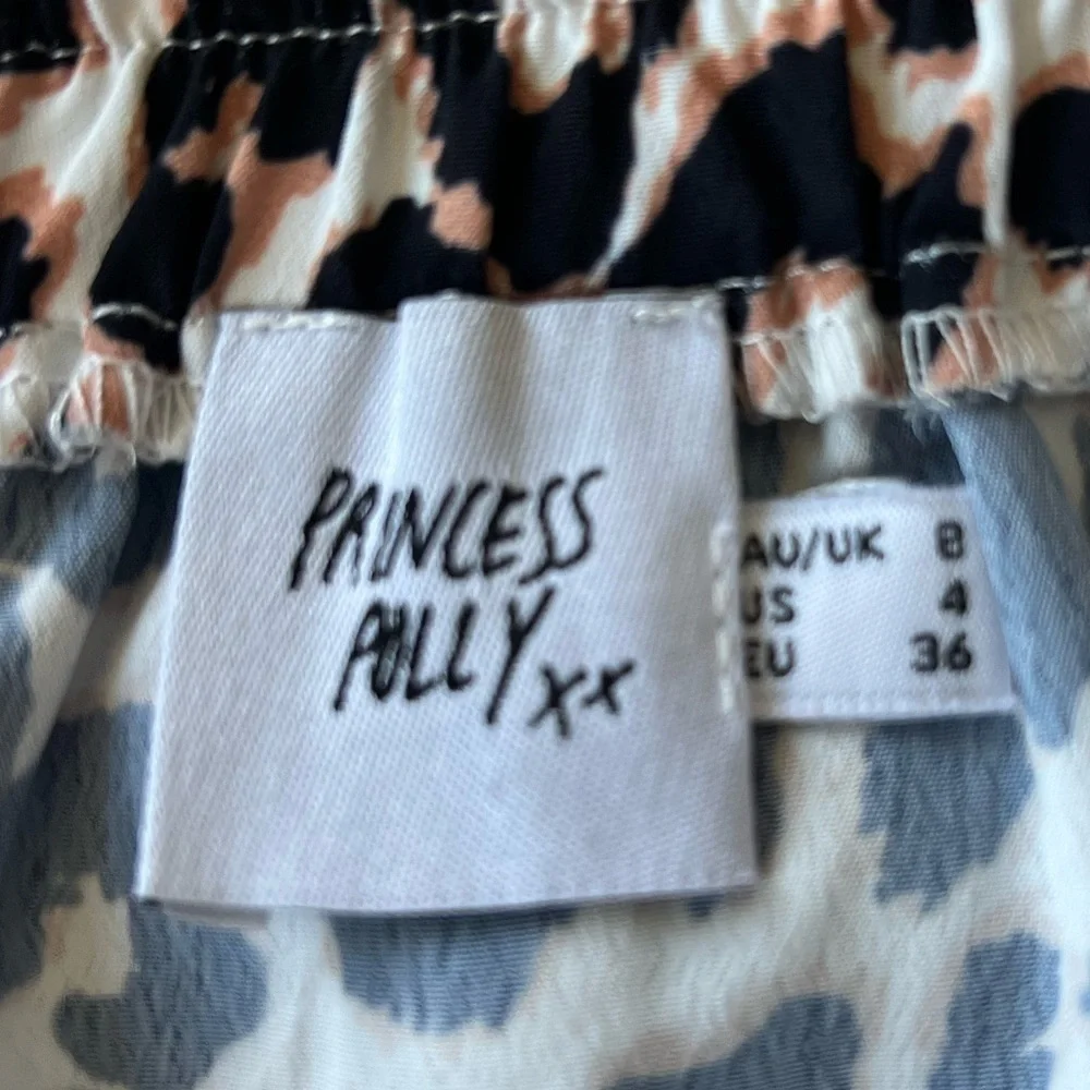 Princess Polly elastic waist animal print leopard ruffle mini skirt size 4